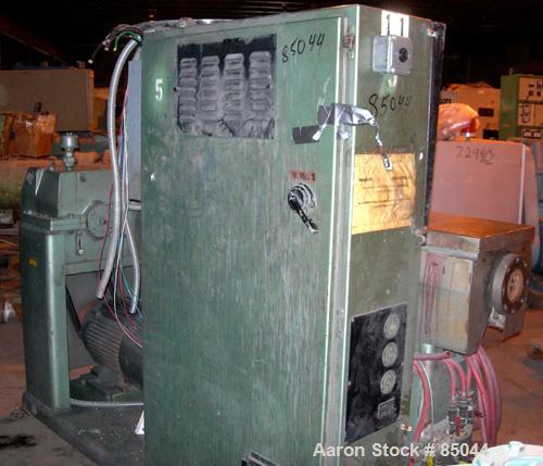 USED: NRM Pacemaker III 2.5" single screw extruder, model PMIII. Approx 24:1 L/D ratio. Electrically heated, air cooled 4 zone non-vented barrel, water cooled feed throat with hopper. Driven by a 40 ...