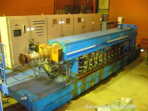 USED: NRM 6" extruder, 32:1 L/D ratio having an electrically heated, liquid cooled (closed loop) barrel at 42-1/2" centerline height but currently mounted on movable base supplying total 84" centerli...