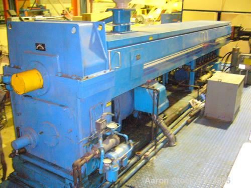 USED: NRM 6" extruder, 32:1 L/D ratio having an electrically heated, liquid cooled (closed loop) barrel at 42-1/2" centerline height but currently mounted on movable base supplying total 84" centerli...