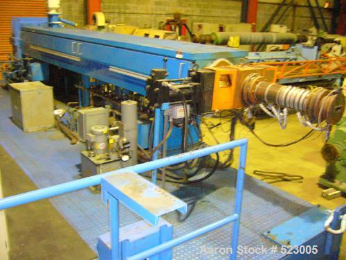 USED: NRM 6" extruder, 32:1 L/D ratio having an electrically heated, liquid cooled (closed loop) barrel at 42-1/2" centerline height but currently mounted on movable base supplying total 84" centerli...