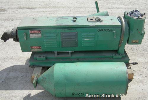 Used: 1-1/2" single screw co-extruder, driven by a 10 hp DC gearmotor and a control panel with an Emerson electrostat drive. Reportedly built 1989.