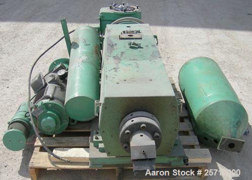 Used: 1-1/2" single screw co-extruder, driven by a 10 hp DC gearmotor and a control panel with an Emerson electrostat drive. Reportedly built 1989.