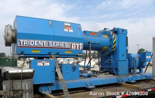 Used PTI 10" Trident Series Single Screw Extruder, Model 10000. Approximate 10 to 1 L/D ratio. 3 Zone electrically heated, water cooled non-vented barrel. Closed loop system with pump, tank and heat ...