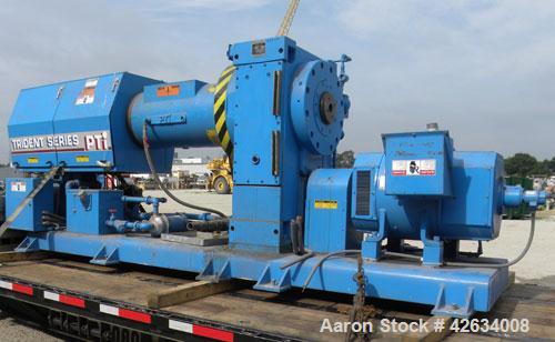 Used PTI 10" Trident Series Single Screw Extruder, Model 10000. Approximate 10 to 1 L/D ratio. 3 Zone electrically heated, water cooled non-vented barrel. Closed loop system with pump, tank and heat ...