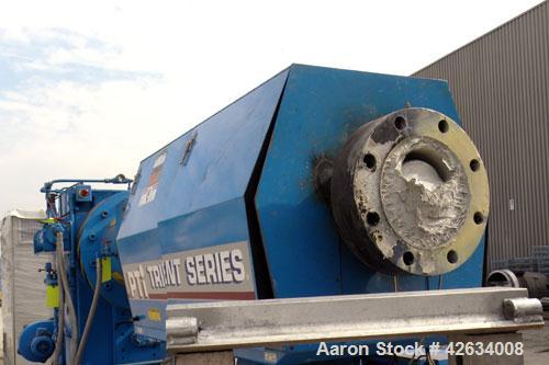 Used PTI 10" Trident Series Single Screw Extruder, Model 10000. Approximate 10 to 1 L/D ratio. 3 Zone electrically heated, water cooled non-vented barrel. Closed loop system with pump, tank and heat ...
