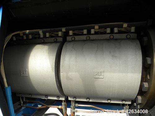 Used PTI 10" Trident Series Single Screw Extruder, Model 10000. Approximate 10 to 1 L/D ratio. 3 Zone electrically heated, water cooled non-vented barrel. Closed loop system with pump, tank and heat ...