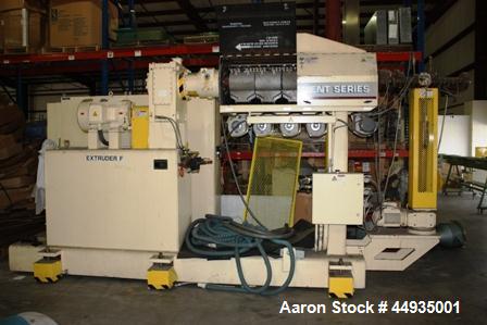 Used PTI 2.5" Diameter Single Screw Extruder, Model 2500.  Approximately 30 to 1 L/D ratio.  Electrically heated, air cooled 5 zone barrel.  Approximately 89” centerline height.  Driven by a 5 hp AC ...