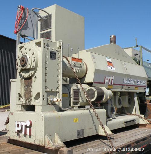 Used PTI 3.5" Trident Series Single Screw Extruder, Model 3500. 30 to 1 L/D ratio. Barrel measures 107" from back of feed throat to end of barrel. 5 zone electrically heated, air cooled, non-vented b...
