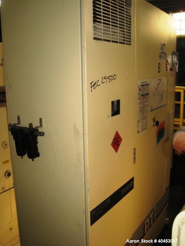 Used PTI model 5000 Trident series 5", 28:1 extruder having a 5-zone electrically heated, air cooled barrel at approximately a 55" centerline height. Gearbox is a Flenders type SZNF-320, has a reduct...