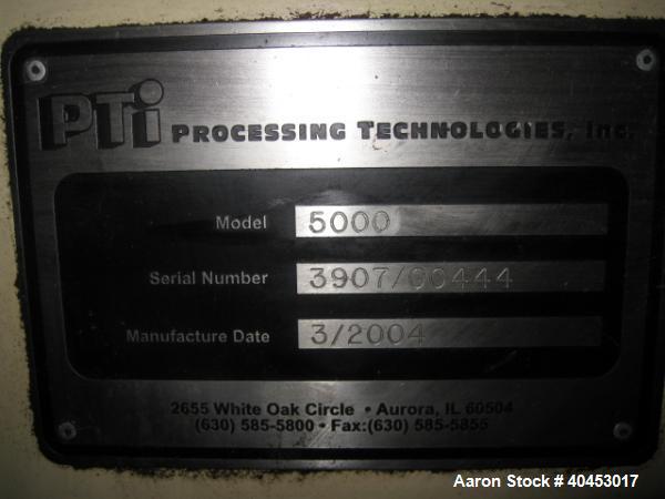 Used PTI model 5000 Trident series 5", 28:1 extruder having a 5-zone electrically heated, air cooled barrel at approximately a 55" centerline height. Gearbox is a Flenders type SZNF-320, has a reduct...