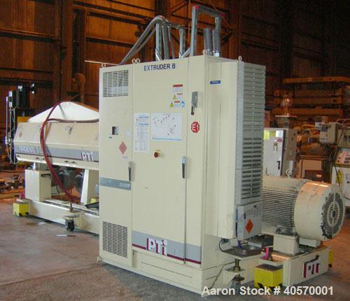 Used PTI  5" Trident Series Single Screw Extruder, Model 5000. Approximate 28 to 1 L/D ratio. 5 zone electrically heated, air cooled, non-vented barrel. Water cooled feed throat, no hopper. Approxima...