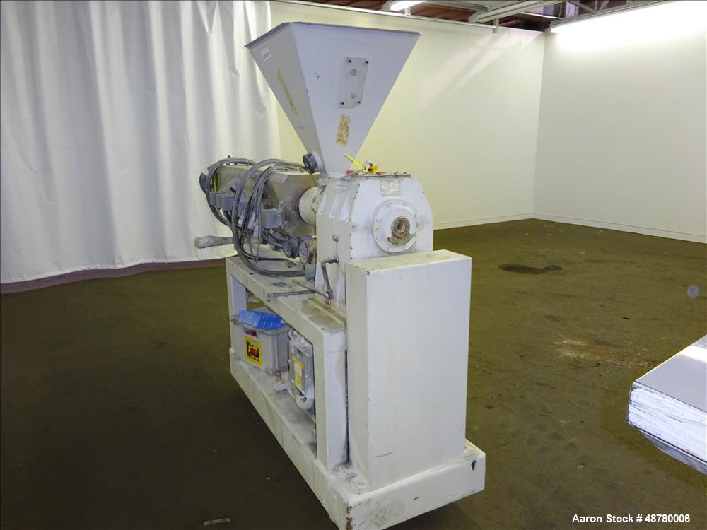 Used Paul Muller Single Screw Extruder, Model Elek 45-36D, 45 mm (1.75") Diameter Screw, 36:1 L/D Ratio. Approximate 71" long x 42.5" center line height. (6) Barrel sections, electrically heated, wat...