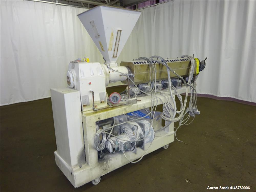 Used Paul Muller Single Screw Extruder, Model Elek 45-36D, 45 mm (1.75") Diameter Screw, 36:1 L/D Ratio. Approximate 71" long x 42.5" center line height. (6) Barrel sections, electrically heated, wat...