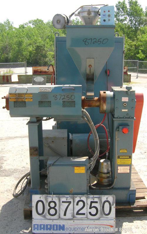 Used Merritt Davis 1 1/2" Single Screw Extruder, approximatly 24:1 L/D ratio. Electrically heated, air cooled 3 zone non-vented barrel. Water cooled feed with hopper, approximately 42" centerline hei...