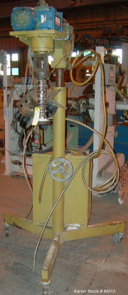 Used Royal Machine 1.25" Pedestal Mounted Single Screw Extruder, Model 252.25, approximate 15:1 L/D ratio. Electrically heated, air cooled 3 zone non-vented barrel. Water cooled feed throat with hopp...