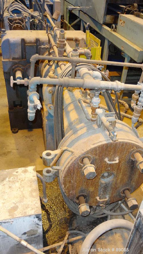 Used Royal 10" Single Screw Dump Extruder, Approximate 6 to 1 L/D ratio, cored screw, (2) zone jacketed barrel. 11" x 12" jacketed feed throat with chute. Approximate 42" centerline height, swing awa...