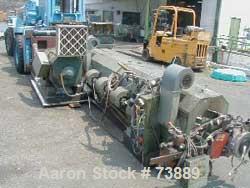 USED: Sterling model EP5 4.5" low boy horizontal extruder with 30:1L/D ratio. Machine has non-vented air cooled barrel with water cooledfeed throat, driven by 250 hp Electrostat DC motor and Wer driv...
