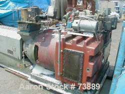 USED: Sterling model EP5 4.5" low boy horizontal extruder with 30:1L/D ratio. Machine has non-vented air cooled barrel with water cooledfeed throat, driven by 250 hp Electrostat DC motor and Wer driv...