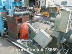 USED: Sterling model EP5 4.5" low boy horizontal extruder with 30:1L/D ratio. Machine has non-vented air cooled barrel with water cooledfeed throat, driven by 250 hp Electrostat DC motor and Wer driv...