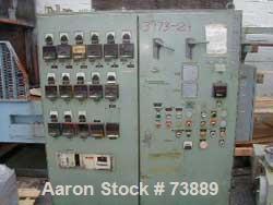 USED: Sterling model EP5 4.5" low boy horizontal extruder with 30:1L/D ratio. Machine has non-vented air cooled barrel with water cooledfeed throat, driven by 250 hp Electrostat DC motor and Wer driv...