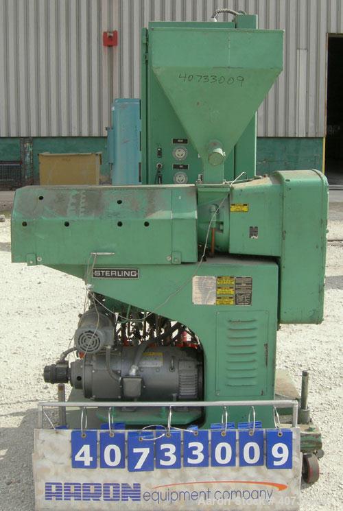 Used Sterling Extruder Corp 1-1/2'' Single Screw Extruder. Approximately 24 to 1 L/D ratio. Electrically heated, water cooled 4 zone non-vented barrel, no water system. Water cooled feed throat with ...
