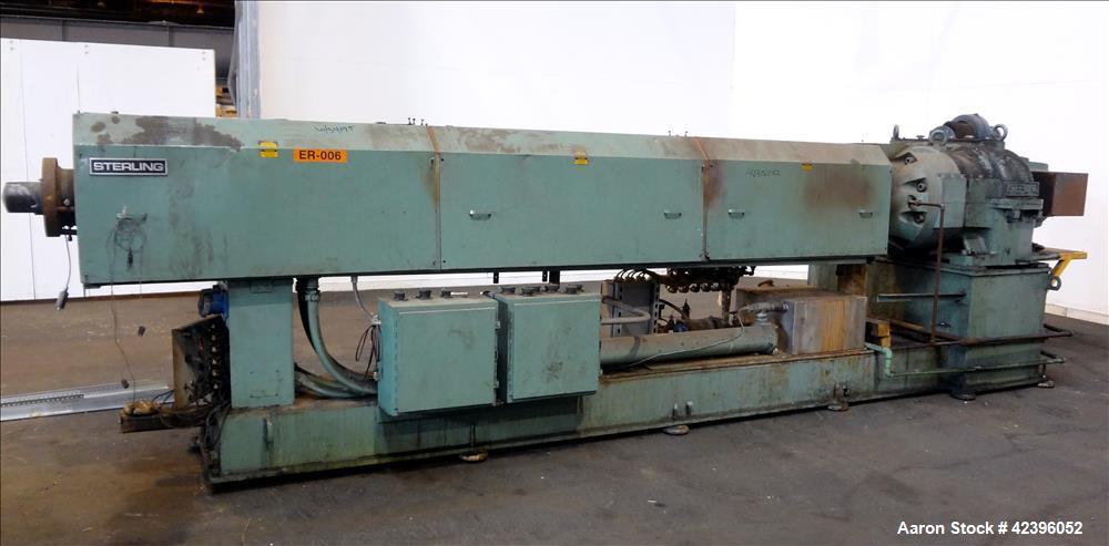 Used Sterling 6" extruder, 32:1 L/D, electrically heated, water cooled barrel with circulation system, jacketed feed section, 51" center line height, 400 hp dc motor with scr controller, 17.212:1 gea...