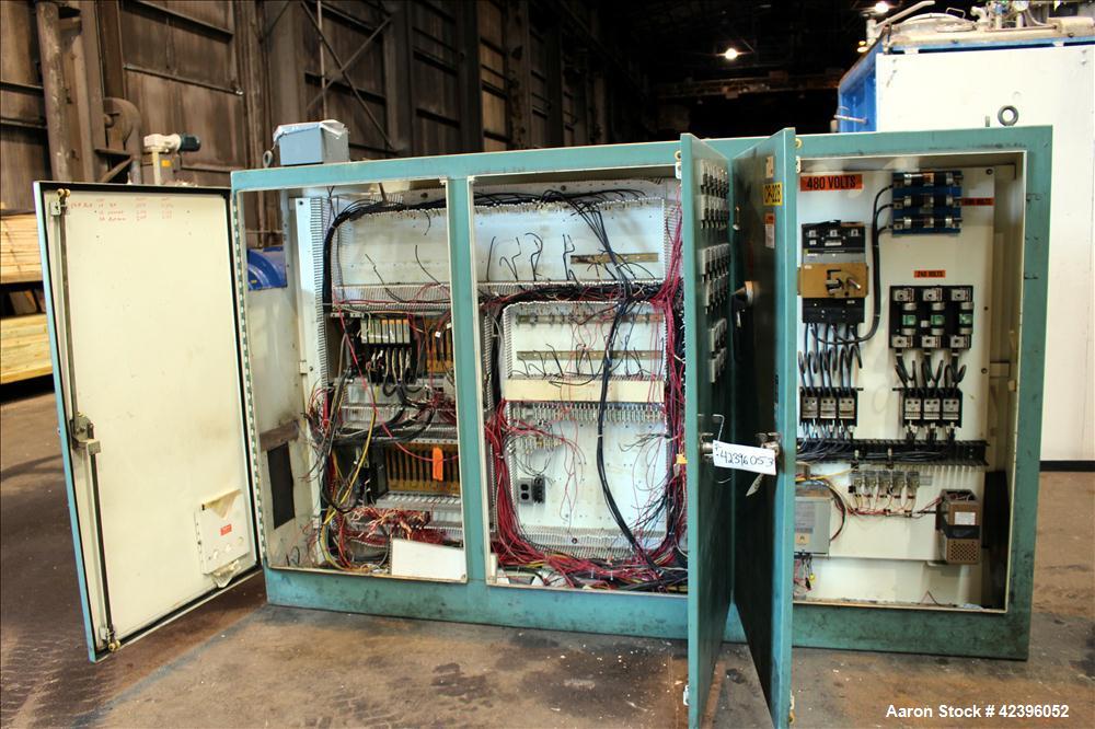 Used Sterling 6" extruder, 32:1 L/D, electrically heated, water cooled barrel with circulation system, jacketed feed section, 51" center line height, 400 hp dc motor with scr controller, 17.212:1 gea...