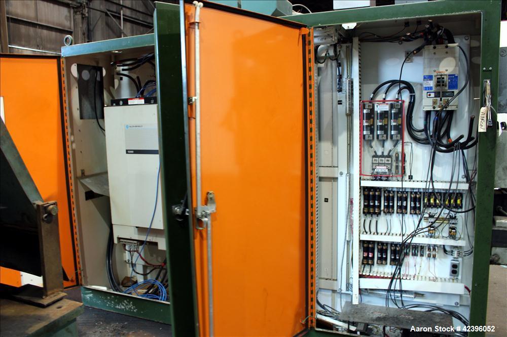 Used Sterling 6" extruder, 32:1 L/D, electrically heated, water cooled barrel with circulation system, jacketed feed section, 51" center line height, 400 hp dc motor with scr controller, 17.212:1 gea...