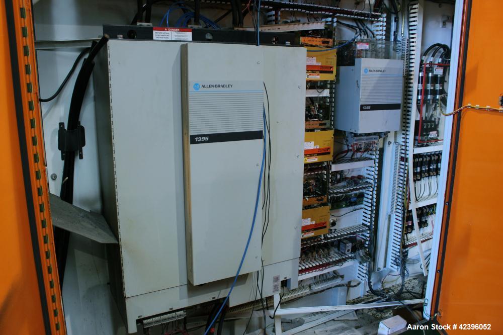 Used Sterling 6" extruder, 32:1 L/D, electrically heated, water cooled barrel with circulation system, jacketed feed section, 51" center line height, 400 hp dc motor with scr controller, 17.212:1 gea...