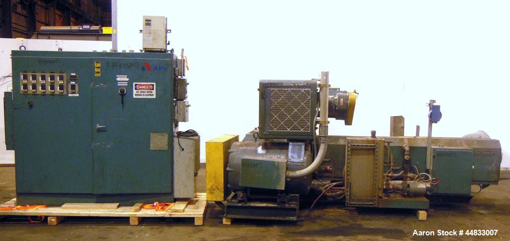Used Sterling Extruder Corp. 3-1/2" Single Screw Lowboy Extruder. Approximately 30 to 1 L/D ratio. Electrically heated, water cooled 5 zone non-vented barrel with a pump, tank, and heat exchanger wat...