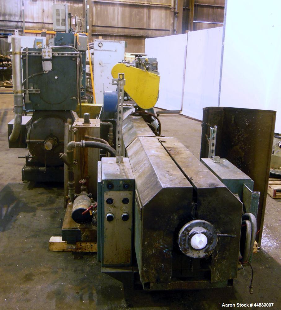 Used Sterling Extruder Corp. 3-1/2" Single Screw Lowboy Extruder. Approximately 30 to 1 L/D ratio. Electrically heated, water cooled 5 zone non-vented barrel with a pump, tank, and heat exchanger wat...