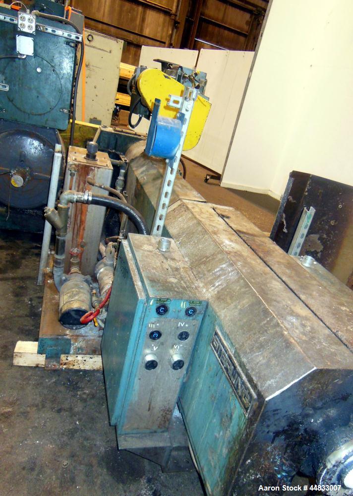 Used Sterling Extruder Corp. 3-1/2" Single Screw Lowboy Extruder. Approximately 30 to 1 L/D ratio. Electrically heated, water cooled 5 zone non-vented barrel with a pump, tank, and heat exchanger wat...