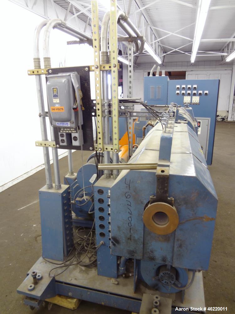 Used Sterling 2.5" Single Screw Extruder, 24:1 L/D Ratio (NO SCREW). Electrically heated, water and air cooled 4 zone non-vented barrel. Water cooled feed throat with hopper. Approximately 41.5" cent...