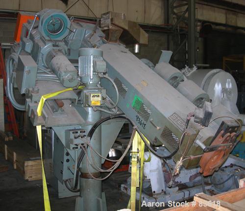 USED: Sterling pedestal mount 2" single screw extruder. Approximate30:1 L/D ratio. Electrically heated, air cooled 4 zone non-ventedbarrel. Water cooled feed throat, no hopper. Driven by a 20 hp,500 ...