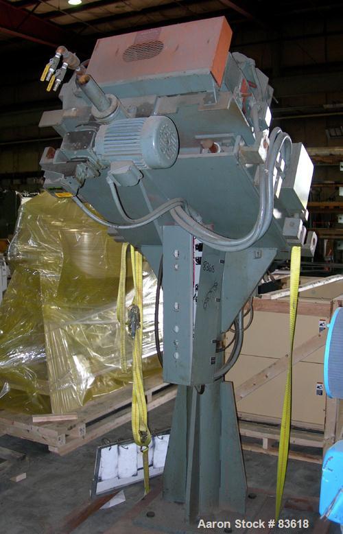 USED: Sterling pedestal mount 2" single screw extruder. Approximate30:1 L/D ratio. Electrically heated, air cooled 4 zone non-ventedbarrel. Water cooled feed throat, no hopper. Driven by a 20 hp,500 ...