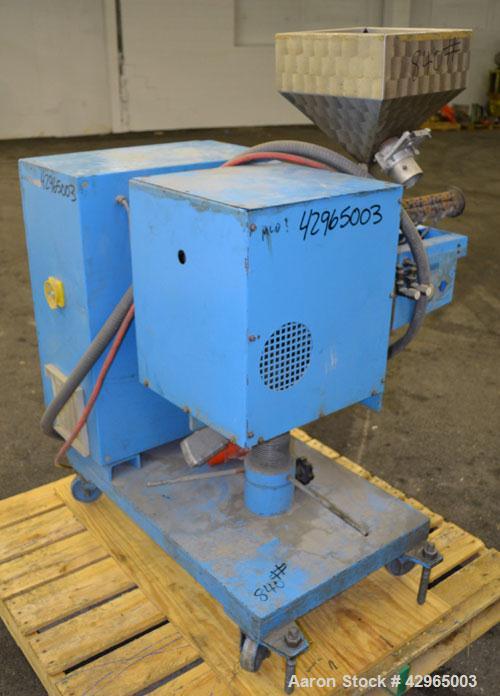 Used Theysohn 3/4’’ Single Screw Co-Extruder. Approximate 20 to 1 L/D ratio. Electrically heated, air cooled 3 zone non-vented barrel. Water cooled feed throat with hopper. Driven by a 2hp, 530 volt,...