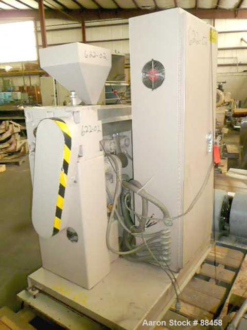 Used Wayne 1" Single Screw Extruder. Approximately 24:1 L/D ratio. Electrically heated, air cooled, non-vented barrel. Feed throat with hopper. Driven by a 5 hp DC motor. Unit includes a control pane...