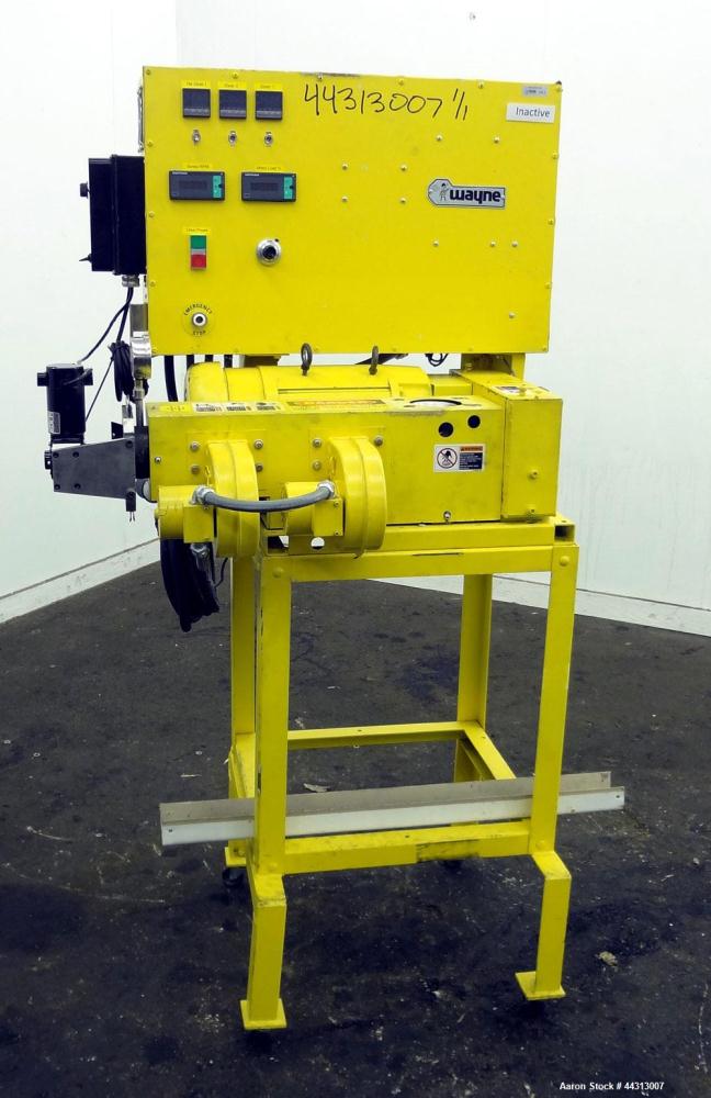 Used Wayne Machine & Die 1” Single Screw Extruder, Model Table Top. Approximately 20 to 1 L/D ratio. Electrically heated, air cooled 2 zone non-vented barrel. Water cooled feed throat, no hopper. Dri...
