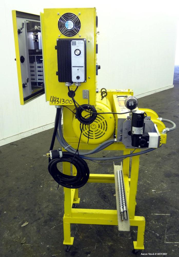 Used Wayne Machine & Die 1” Single Screw Extruder, Model Table Top. Approximately 20 to 1 L/D ratio. Electrically heated, air cooled 2 zone non-vented barrel. Water cooled feed throat, no hopper. Dri...