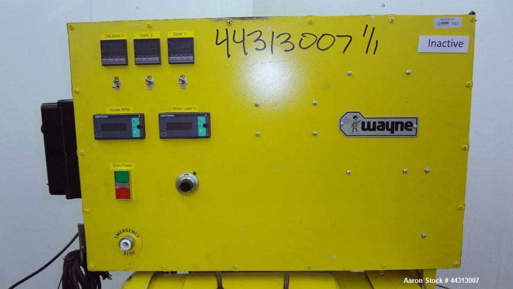 Used Wayne Machine & Die 1” Single Screw Extruder, Model Table Top. Approximately 20 to 1 L/D ratio. Electrically heated, air cooled 2 zone non-vented barrel. Water cooled feed throat, no hopper. Dri...