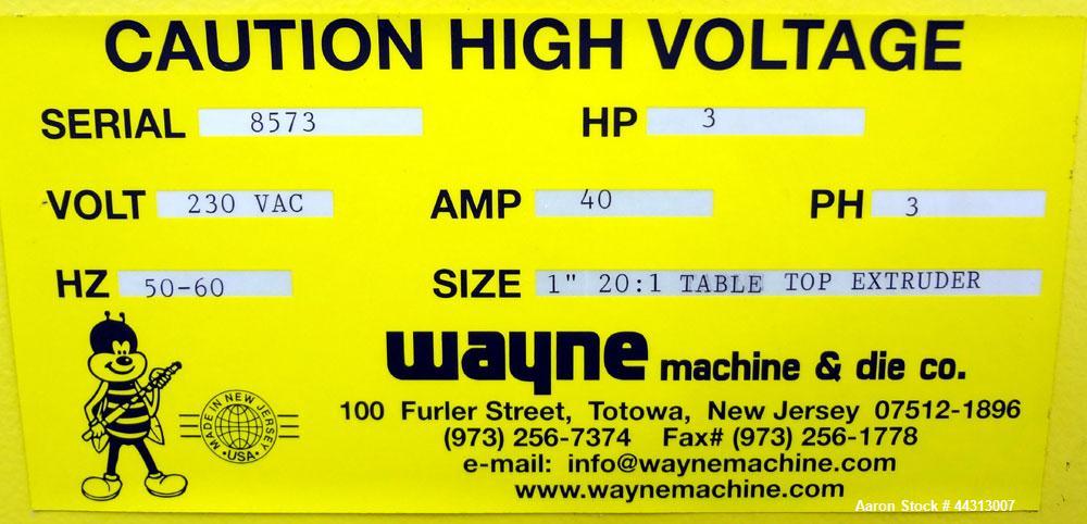 Used Wayne Machine & Die 1” Single Screw Extruder, Model Table Top. Approximately 20 to 1 L/D ratio. Electrically heated, air cooled 2 zone non-vented barrel. Water cooled feed throat, no hopper. Dri...