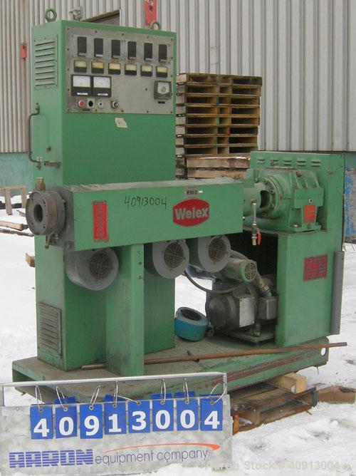 Used Welex 2" Single Screw Extruder, Model 20024:1 R.H. Approximate 24:1 L/D ratio. Electrically heated, air cooled 3 zone non-vented barrel. Water cooled feed throat, no hopper. Driven by a 20 hp, 2...