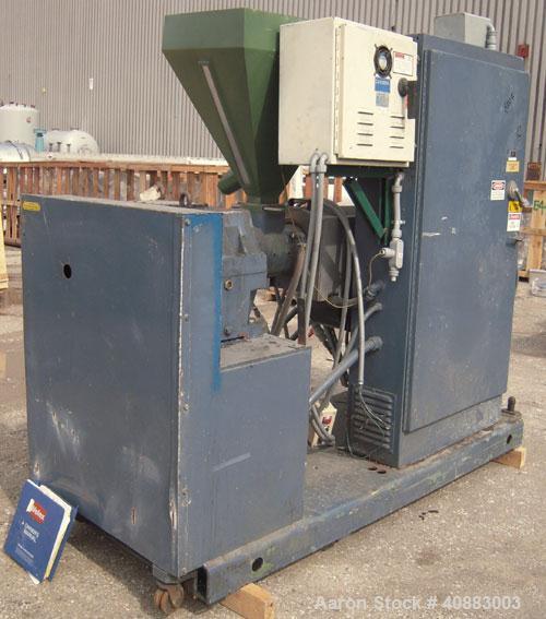 Used Welex 2 1/2" Single Screw Extruder, Model 250, approximately 24 to 1 L/D ratio. Electrically heated, air cooled 3 zone non-vented barrel. Water cooled feed throat, with hopper. Approximately 45"...