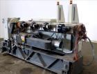 Used Cincinnati Milacron 75mm Single Screw Extruder, Model Proton 70-30G. Approximate 30 to 1 L/D ratio. Electrically heated, air cooled 4 zone non-vented barrel, water cooled feed throat, no hopper....