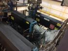 Used Davis Standard Single Screw Extruder, Model DS-15H. 1.5” screw diameter. Barrel Heater: 5 Zone/460V/2200W. Motor: 24HP/460V/3Ph. Cooling: Water. Includes: tower frame, spin beam, insulation jack...