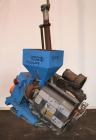 Used Merritt Davis ¾” Pedestal Mounted Single Screw Co-Extruder. Approximate 24 to 1 L/D ratio. Electrically heated, air cooled 3 zone non-vented barrel. Water cooled feed throat with hopper. Driven ...