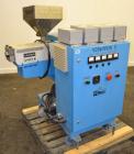 Used Theysohn 3/4’’ Single Screw Co-Extruder. Approximate 20 to 1 L/D ratio. Electrically heated, air cooled 3 zone non-vented barrel. Water cooled feed throat with hopper. Driven by a 2hp, 530 volt,...