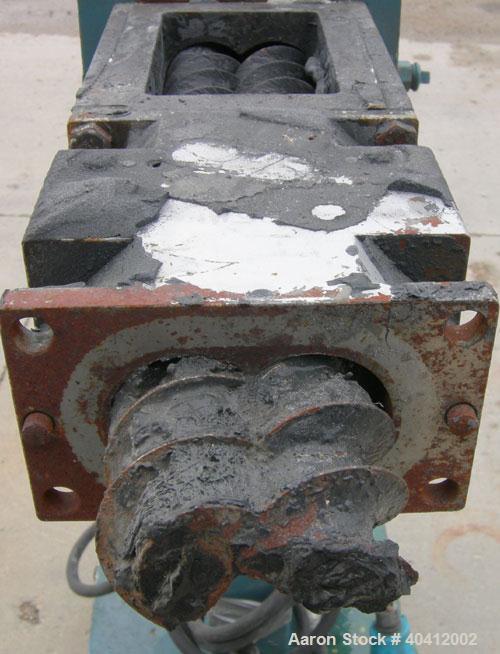 Used Krupp Werner Pfleiderer 58mm twin screw side feeder, model ZS-B58. (2) 2.2" (52mm) side by side screws, top feed, no hopper. Driven by a 7.5 hp, 3/60/230/460 volt, 1770 rpm gearmotor, ratio 6.7 ...