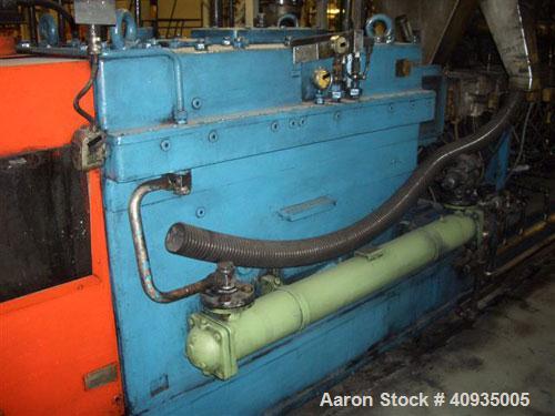 Used Twin Screw Extruder 90/92 mm. 12 barrel design. 4.997 gearbox ratio. 350 rpm output. 400 hp DC/SCR drive. Complete temp control panel. (2) ZSB 70mm side feeders. Multi hole strand die.