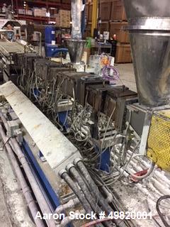 Used- Steer Mega 58mm Twin Screw Extruder. 11 barrel sections. Barrel and screw material are comprised of WR5.  The extruder...